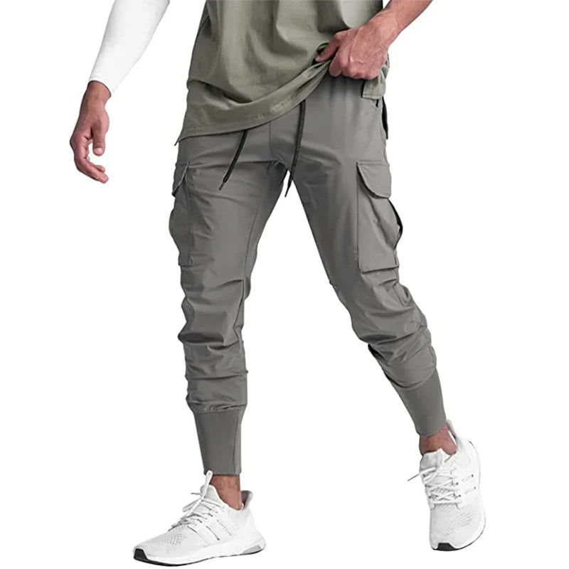 Calças Esportivas Camufladas Masculinas — Leves, Elásticas e de Secagem Rápida para Treinos com Liberdade Total!