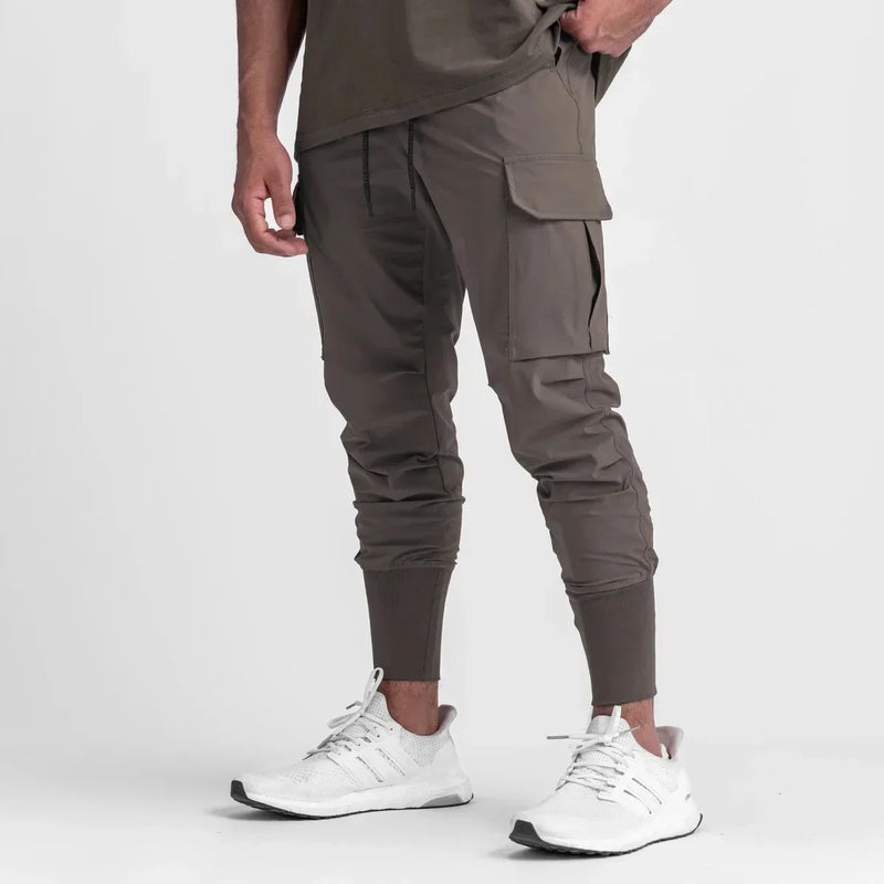 Calças Esportivas Camufladas Masculinas — Leves, Elásticas e de Secagem Rápida para Treinos com Liberdade Total!