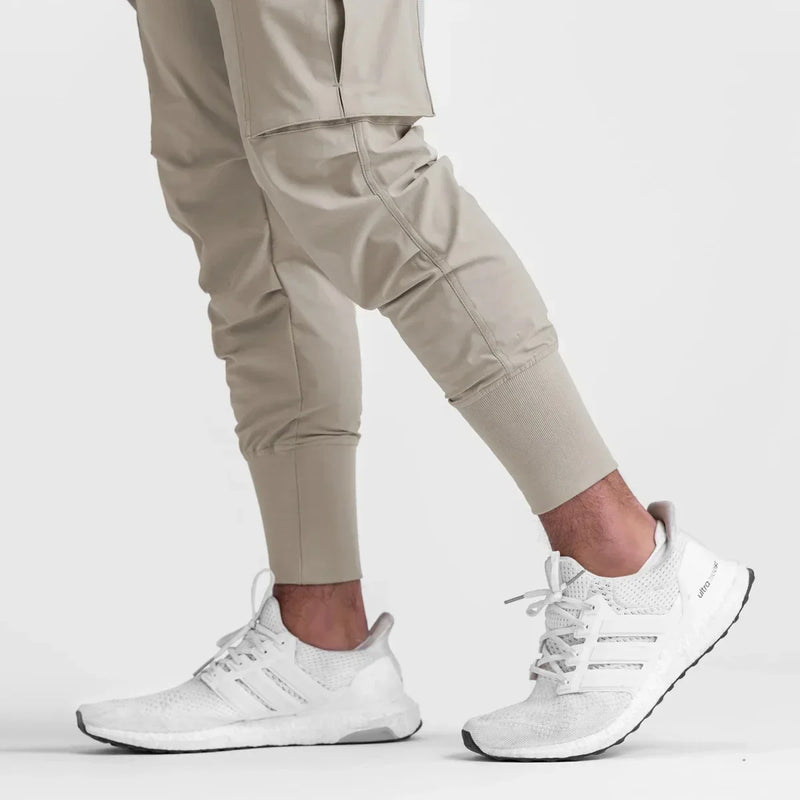 Calças Esportivas Camufladas Masculinas — Leves, Elásticas e de Secagem Rápida para Treinos com Liberdade Total!