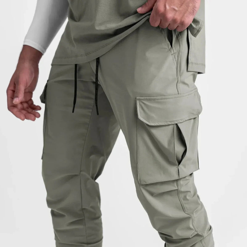 Calças Esportivas Camufladas Masculinas — Leves, Elásticas e de Secagem Rápida para Treinos com Liberdade Total!