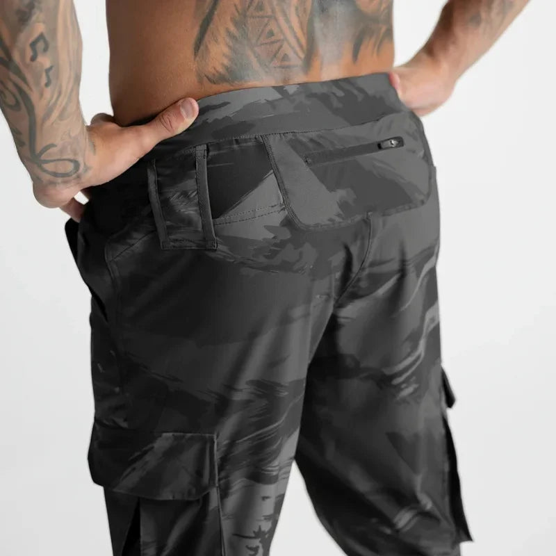 Calças Esportivas Camufladas Masculinas — Leves, Elásticas e de Secagem Rápida para Treinos com Liberdade Total!