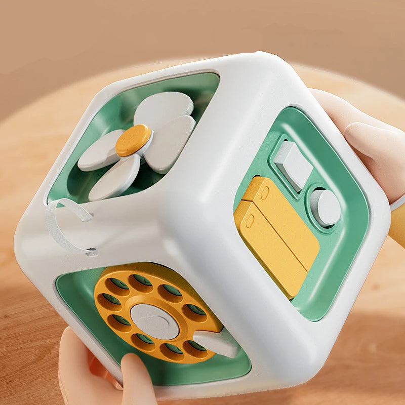 Descubra o Cubo 6 em 1 — o brinquedo sensorial que estimula a curiosidade, coordenação e aprendizado do seu bebê de forma divertida e educativa!