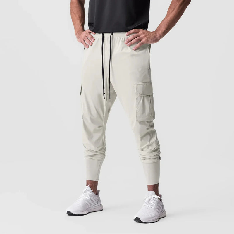 Calças Esportivas Camufladas Masculinas — Leves, Elásticas e de Secagem Rápida para Treinos com Liberdade Total!
