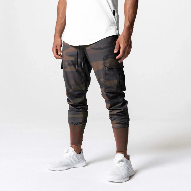 Calças Esportivas Camufladas Masculinas — Leves, Elásticas e de Secagem Rápida para Treinos com Liberdade Total!