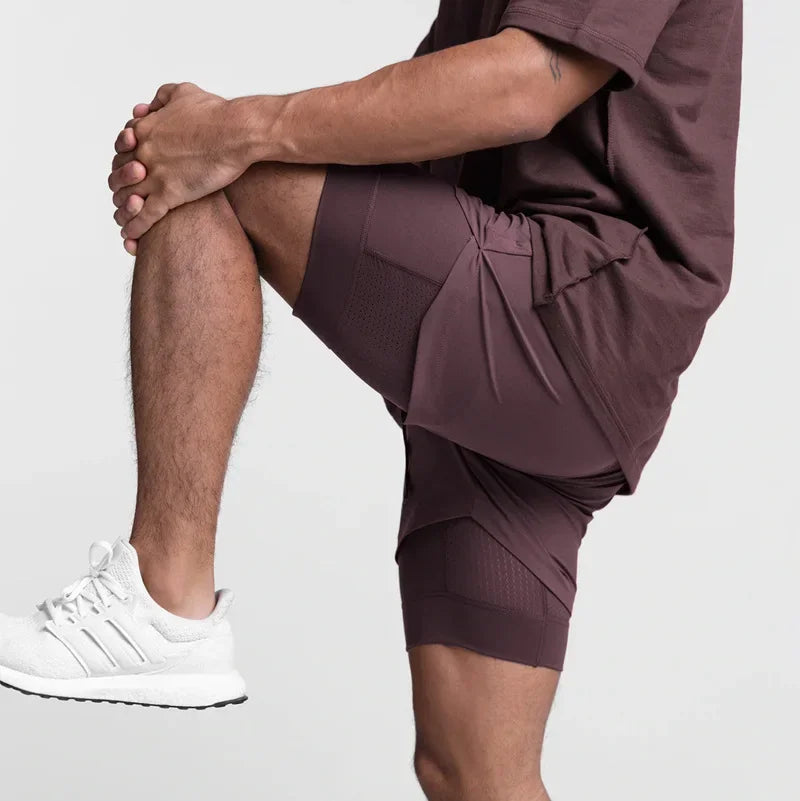 O Short Masculino 2 em 1 Que Respira com Você – Liberdade, Secagem Rápida e Estilo em Camadas para Treinos, Praia e Corridas!