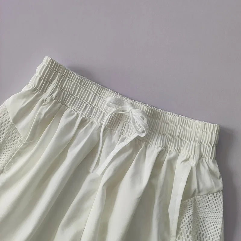 Shorts Fitness 2 em 1 com Cintura Alta — O Segredo das Mulheres que Dominam o Treino com Estilo, Conforto e Liberdade!