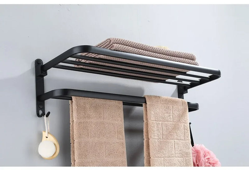 Suporte Dobrável de Toalha em Preto Fosco – Elegância e Praticidade com Gancho Extra e 50CM de Funcionalidade na Sua Parede!