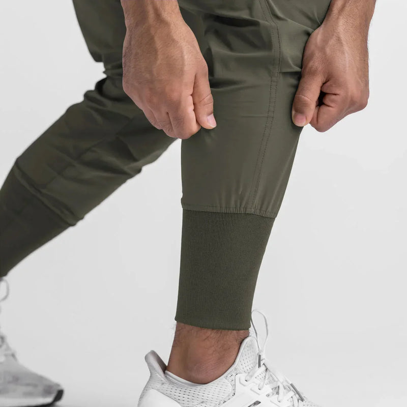 Calças Esportivas Camufladas Masculinas — Leves, Elásticas e de Secagem Rápida para Treinos com Liberdade Total!