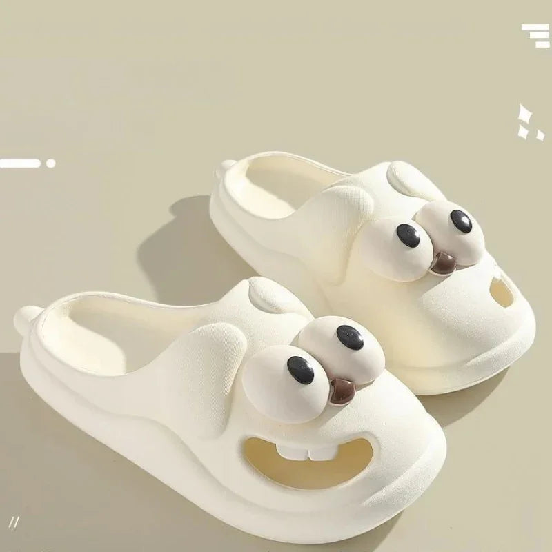 Chinelos Divertidos de Cachorro Olhudo com Língua de Beijo – Conforto, Humor e Estilo em Cada Passo!